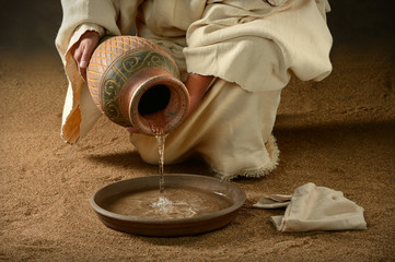 Jesus Pouring Water on Pan