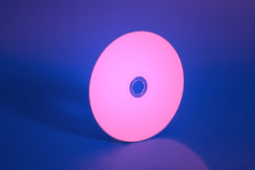 Compact disk on blue background