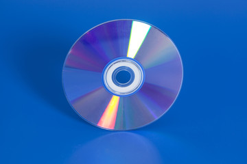 Compact disk on blue background