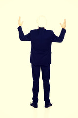 Smiling businessman with open arms up