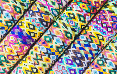 Colorful mexican woven bracelets background