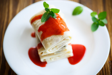 sweet pancakes with strawberry jam