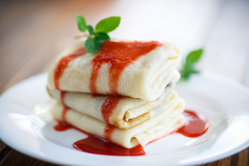 sweet pancakes with strawberry jam