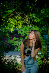 beautiful girl in denim overalls