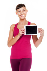 Portriat of fitness woman with tablet. isolated on white backgro