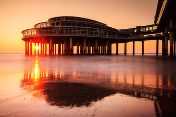 Sunset at the ufo looking part the pier of Scheveningen, the Netherlands