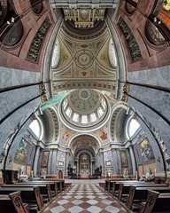 Obraz premium Vertical panorama of the interior of Esztergom Basilica. The Primatial Basilica of the Blessed Virgin Mary Assumed Into Heaven and St Adalbert is the biggest building in Hungary.