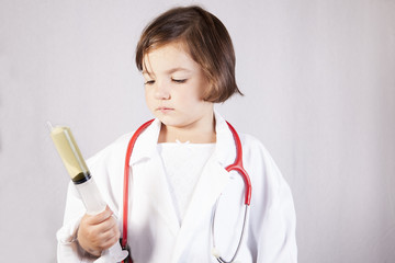 Holding a huge syringe