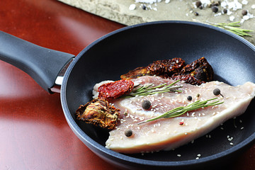 steak in a frying pan