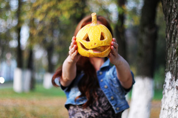 red-haired girl Halloween pumpkin