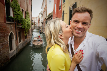 Fototapeta na wymiar Cheerful couple in Venice