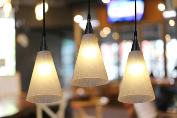 Warm lighting modern ceiling lamps in the cafe.