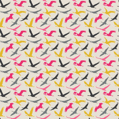 Seamless pattern of flying birds.