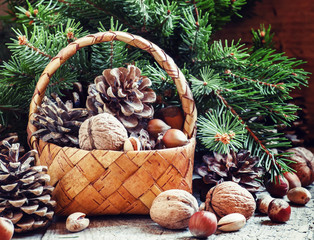 Christmas or New Year greeting card with a wicker basket with pi