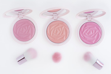 pink ,orange and rosy pink tone blusher on white background