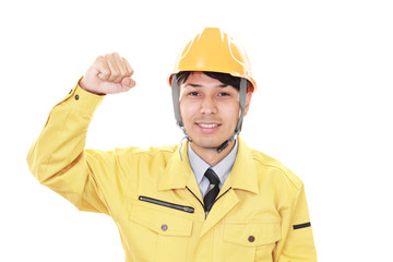 ガッツポーズの労働者