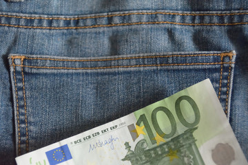 hundred euro note over the jean fabric