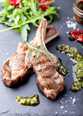 Grilled meat, mutton, lamb rack with fresh salad.