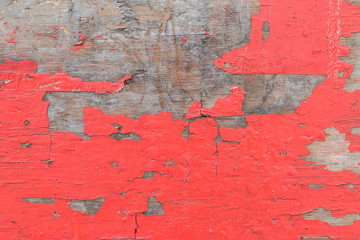 Closeup old and peeling painted wood board background