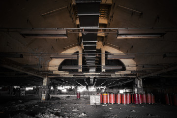Fototapeta na wymiar dirty industrial interior of an abandoned factory building