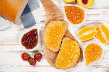 Fototapeta na wymiar Slices of bread with jam