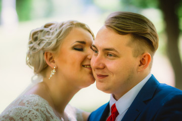  beautiful young couple stand on background forest