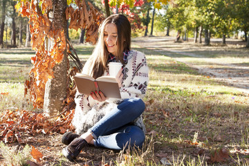 young girl in autumn outdoors