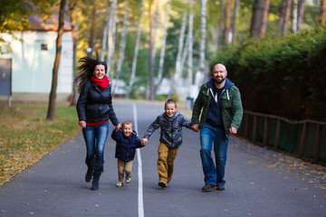 Happy family in fall