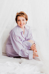 Happy woman with a cup of coffee © OlgaKhorkova