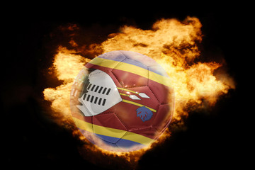 football ball with the flag of swaziland on fire