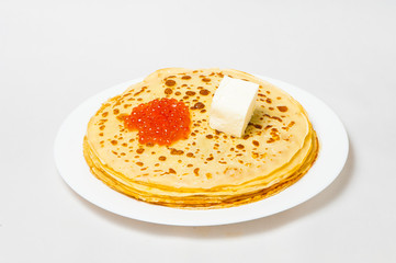 some pancakes on the white plate with red caviar