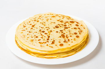 some pancakes on the white plate