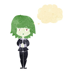 cartoon vampire woman with thought bubble
