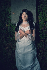 Witch from a crypt in the cemetery