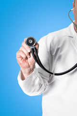 Doctor holding stethoscope in hand