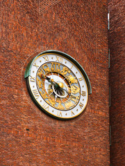Astronomical clock on wall City Hall - Oslo Norway