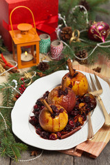Fototapeta na wymiar Baked Apples with Cinnamon. Christmas composition. Selective focus.