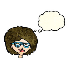 cartoon woman wearing spectacles with thought bubble