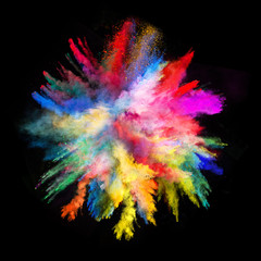 Launched colorful powder on black background