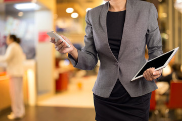 Businesswoman in the shopping mall.