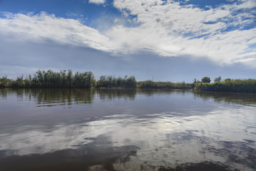 The surface of the lake. 
The surface of a mountain lake on a windy day .
