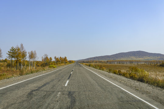 Mountain road on the Far Eastern taiga.
Mountain road on a ridge of the Sikhote - Alin , Far East Russia .