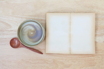 Stock Photo:.Open Book blank on old wood background