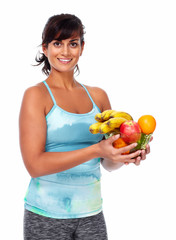 Healthy young woman with fruits.