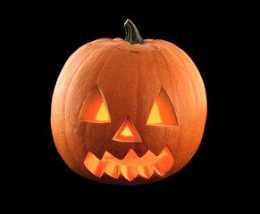 Halloween pumpkin with scary face isolated on black background.
