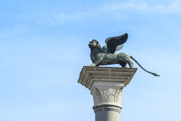 Winged St Mark Lion symbol of Venice on its column - Venice, Italy