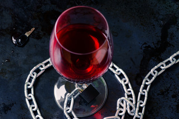 Glass of wine is fixed chain