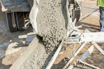 Cement or mortar is inside cement mixer. Cement or mortar is mix