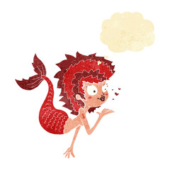 cartoon mermaid blowing a kiss with thought bubble