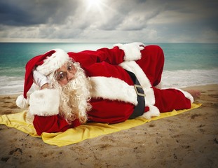 Beach holiday of Santa Claus